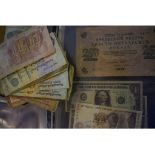 Assorted world banknotes, in six albums,