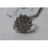 A 9ct gold and diamond cluster ring