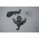 A Art Nouveau style silver and enamel peacock brooch,