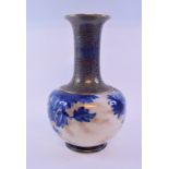 A Royal Doulton vase, with floral decoration, the base stamped 2485, 33.