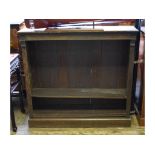 An Edwardian oak open bookcase,