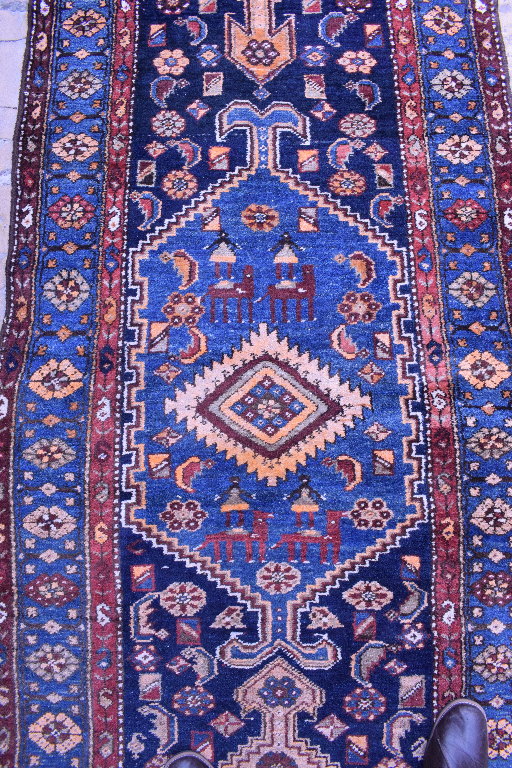 A Persian Nahavand runner, with motifs on a blue ground within a multi border, - Bild 3 aus 3