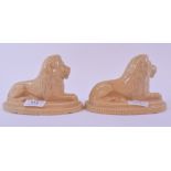 A glazed stoneware lion, 10 cm high,