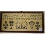 A Scottish George III sampler, worked the alphabet, figures, flowers, and initials of the monarchs,