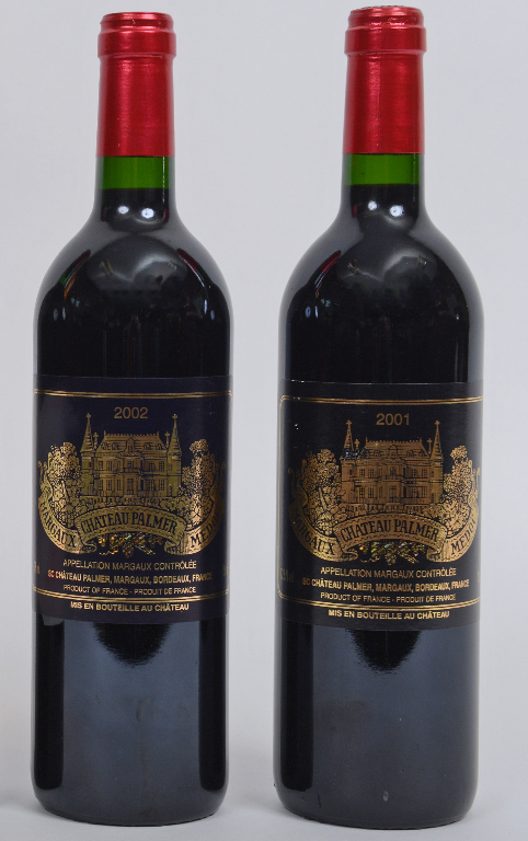 A bottle of Chateau Palmer Margaux, 2001, and another,