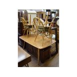 An Ercol elm dining table, 150 cm wide,