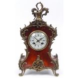 A Louis XVI style clock, the 8.