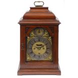A bracket clock, the 17 cm arched square brass dial signed Stephen Asselin, London,