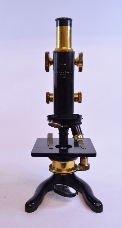 A Keeler ophthalmoscope, cased, a Watson & Sons 'Kima' microscope, cased, two sphygmonanometers,