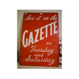 An enamel advertising sign, See it in the Gazette on Tuesday and Saturday, 76 x 51 cm,