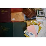 Assorted world stamps, loose and in albums, ***a camera,