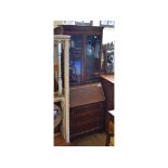 An Edwardian inlaid bureau bookcase, of small proportions,