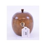 A turned wood tea caddy, in the form of an apple,