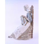 A Lladro figure, Summer Serenade, 6193, 31 cm high, another, The Embroider, 29.