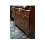 A mahogany bachelor's style chest, of three short and three long drawers, on bracket feet,