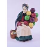 A Royal Doulton figure, The Old Balloon Seller, HN1315, a Grangers & Co Worcester leaf shaped vase,