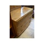 An Ercol elm chest, of three long drawers,