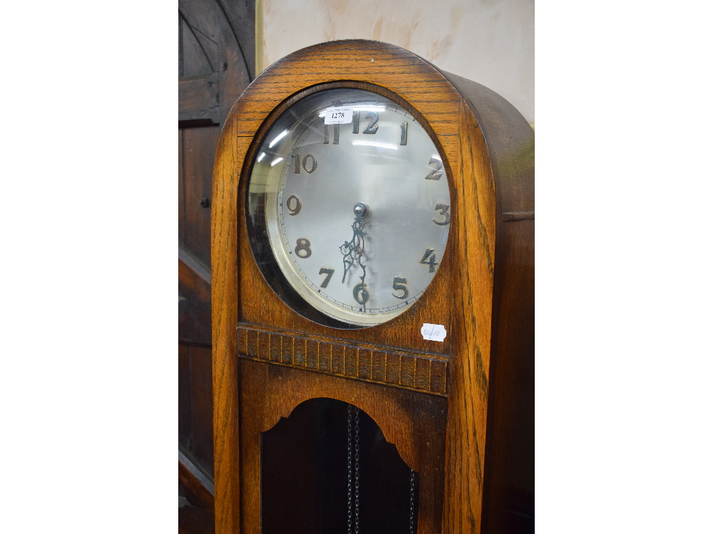 A 1930s longcase clock, the 25 cm diameter silver dial with Arabic numerals, - Image 2 of 3