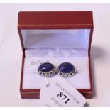 A pair of silver and lapis lazuli cufflinks,