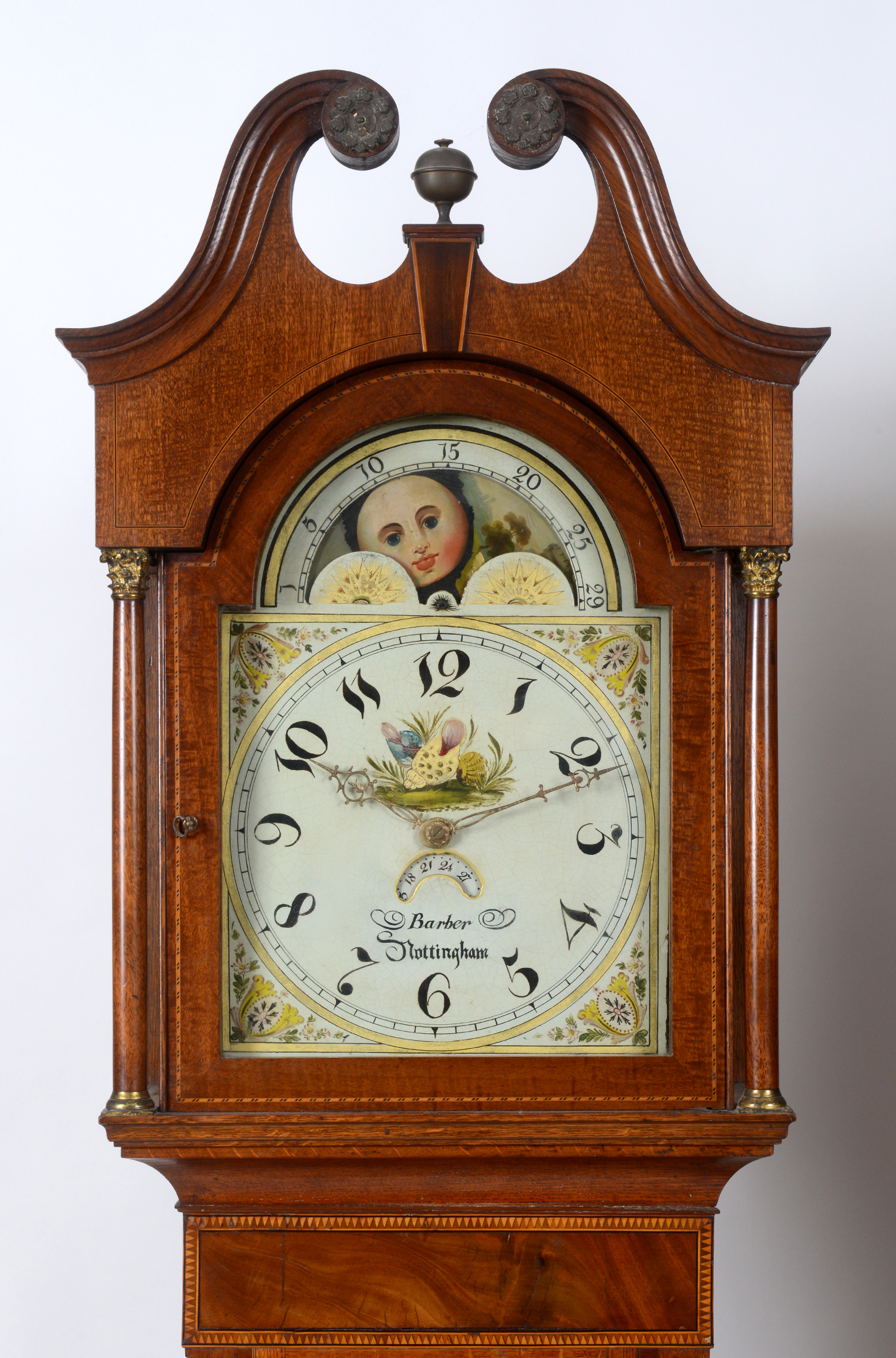 A longcase clock,