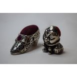 A novelty silver shoe pincushion,