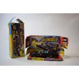 A Corgi Toys Batmobile, 267, with Batman and Robin figures, some instructions,