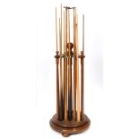 An Edwardian mahogany cue stand, of free standing circular form, 48 cm wide,