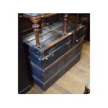 A 19th century trunk, 92 cm wide, a sideboard, a chest of drawers, two tables,