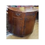 A George III D shaped mahogany side cabinet,