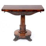 A 19th century rosewood revolving tilt top card table, raised on a turned column,