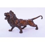 A bronzed lion, 25 cm long