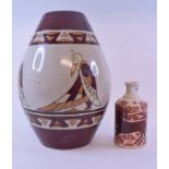 A pottery vase, decorated stylised anima