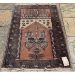 An Eastern prayer rug,