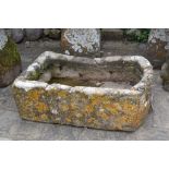 A stone D shape trough, some frost damage,