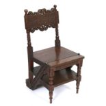 A late 19th century Burmese carved hardwood metomorphic chair/library steps See