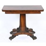 A late Regency rosewood card table, on a tapering column and concave sided platform base,