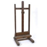 A late Victorian/Edwardian oak artists studio easel,