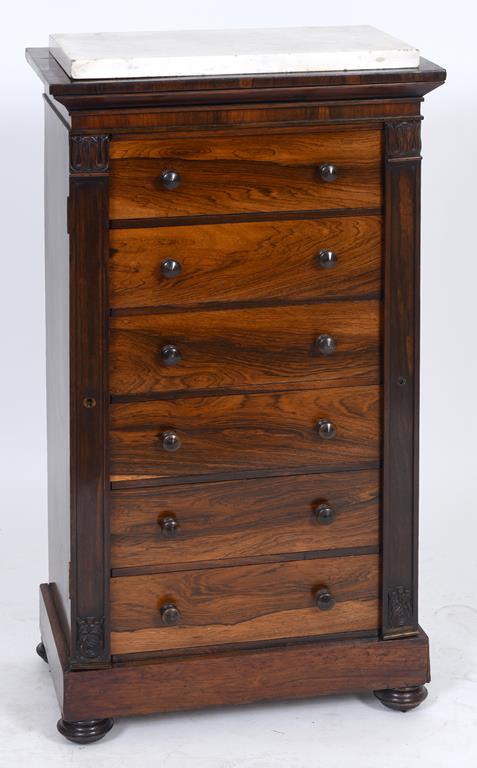 An early Victorian rosewood Wellington chest, the marble top above six graduated long drawers,