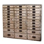 A bank of thirty three drawers, removed from a workshop,