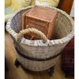 A pull along wicker basket, on wheels, 68 cm diameter,