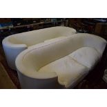 After Pierre Chareau a pair of Corbeille style sofas,