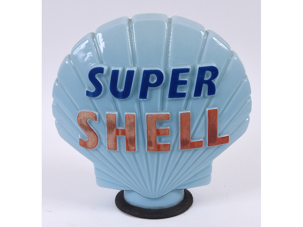 A Super Shell blue glass clam shell petrol pump globe, with rubber collar, some fading,