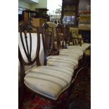 A set of four Edwardian inlaid rosewood shield back chairs (4)