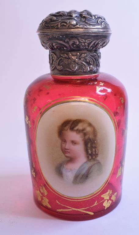 A Bohemian cranberry glass scent bottle, decorated a bust portrait of a young girl,