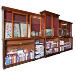 A breakfront library bookcase, an association,