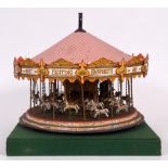 A model of a galloping horses fairground carousel, approx.