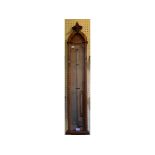 An Admiral Fitzroy's barometer, with thermometer, in an oak case,