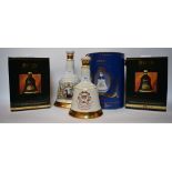 A Bell's whisky Christmas decanter, 1993, another 1994, and three other similar, Princess Eugenie,