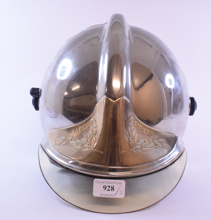 A French CGF Gallet firefighter's helmet, a Starlite firefighter's helmet,