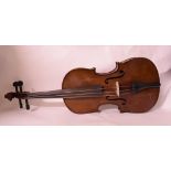 A violin, with a 14 inch two piece back